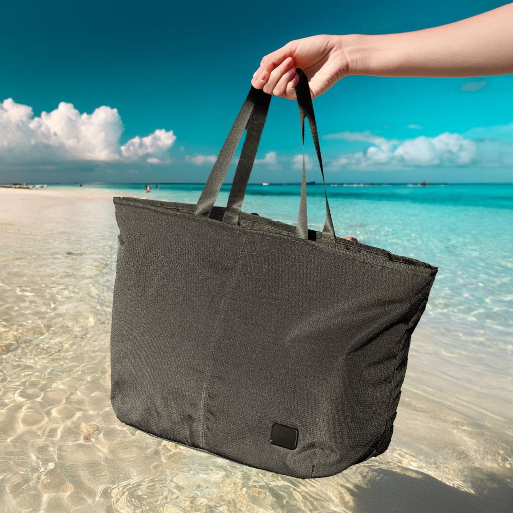 Firefly a hand holding a bag on clear beach 82957.jpg