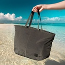 Firefly a hand holding a bag on clear beach 82957.jpg